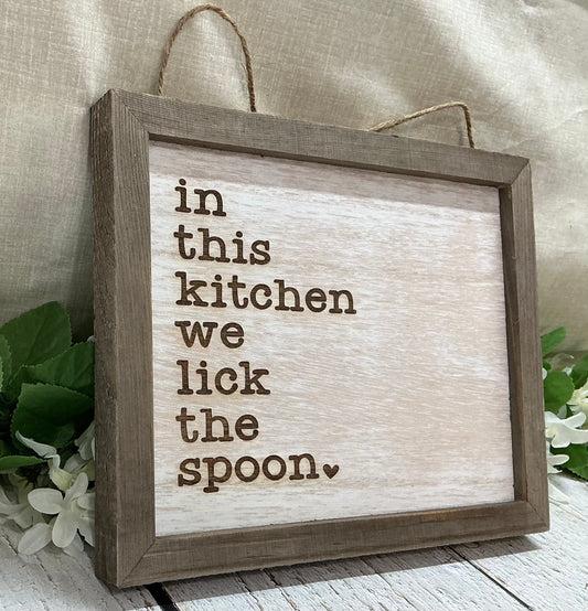 In This Kitchen We Lick The Spoon Sign